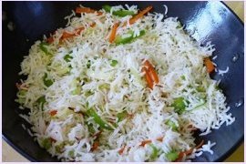 Add cooked rice and mix properly.