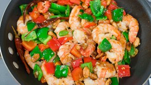 Shrimp takes a turn in a twist on the Chinese-American takeout classic of Kung Pao Chicken for a weeknight meal that comes together in 15 minutes.