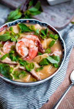 Simple and comforting Asian shrimp and noodle soup flavored with miso paste, shiitake mushrooms, and fresh ginger.