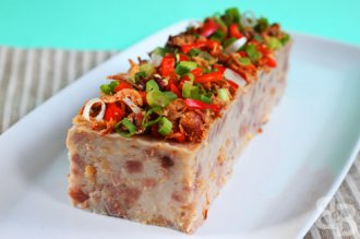 Yam Cake Recipe (Or Kuih) recipe - This is basically a steamed cake made from yam pieces, dried prawns and rice flour. It is then topped with deep fried shallots, spring onions, chillis and dried prawns, and usually served with a chilli dipping sauce. | rasamalaysia.com